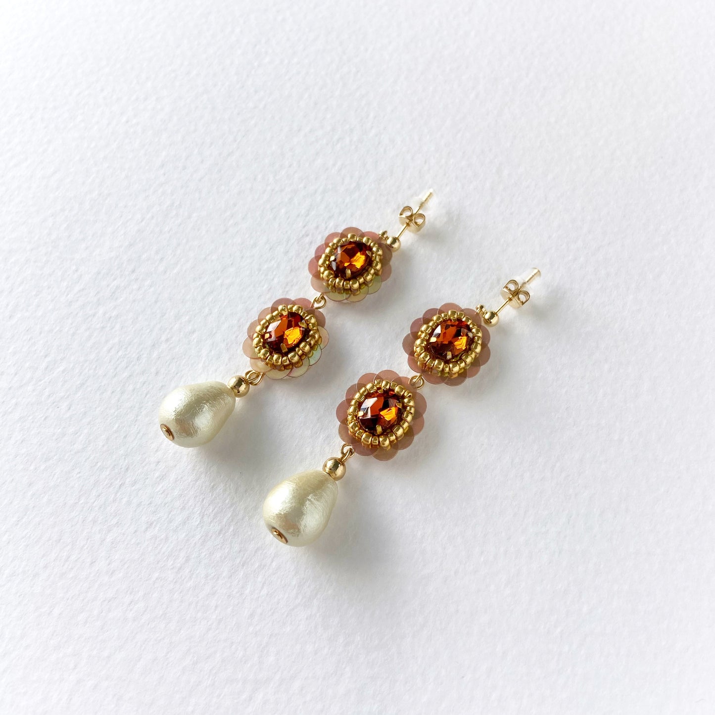 Gold earrings with amber beads and cotton pearl drops