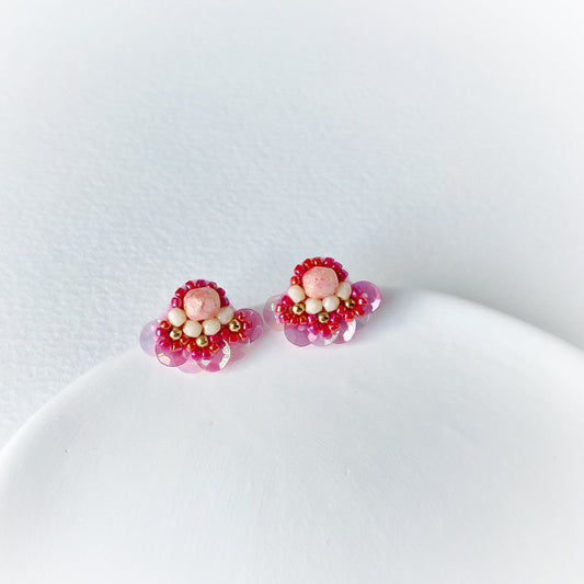 Pair of pink and gold earrings